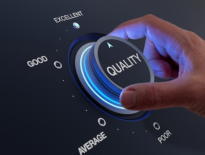 Selecting excellent quality to increase customer satisfaction. Quality assurance management and control for products or services. Concept with QA manager's hand turning knob.