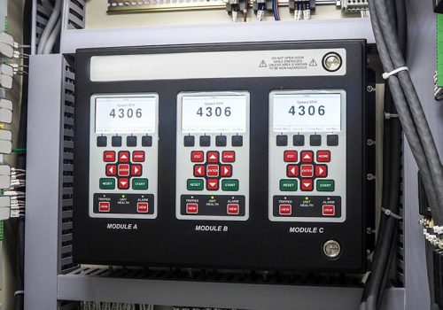Electrical breaker inside electric panel in power plant.